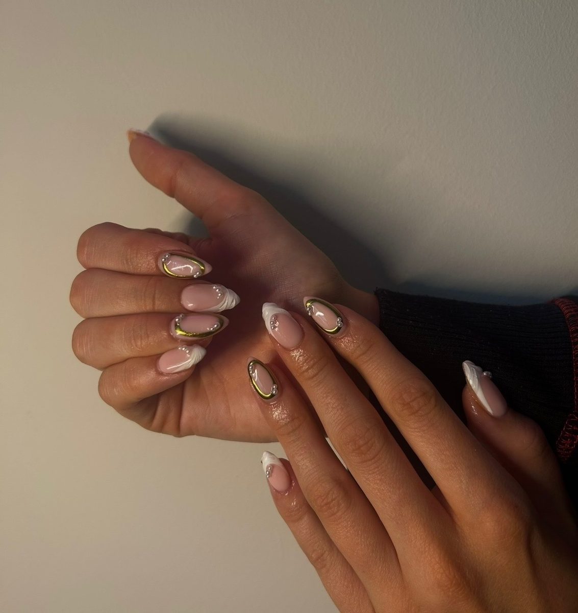 Gold-line French nails with pearl detail