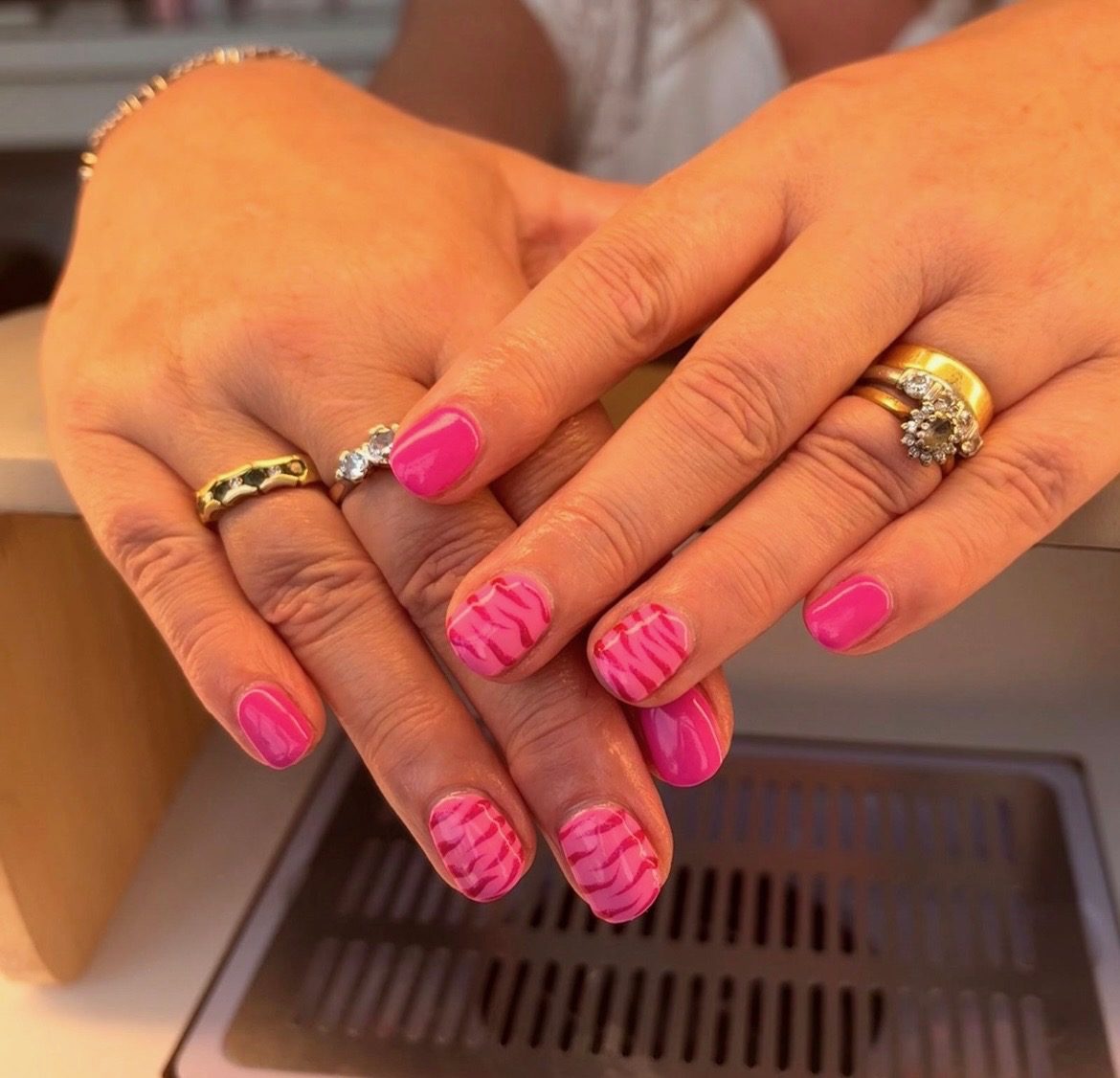 Pink animal-print gel nails